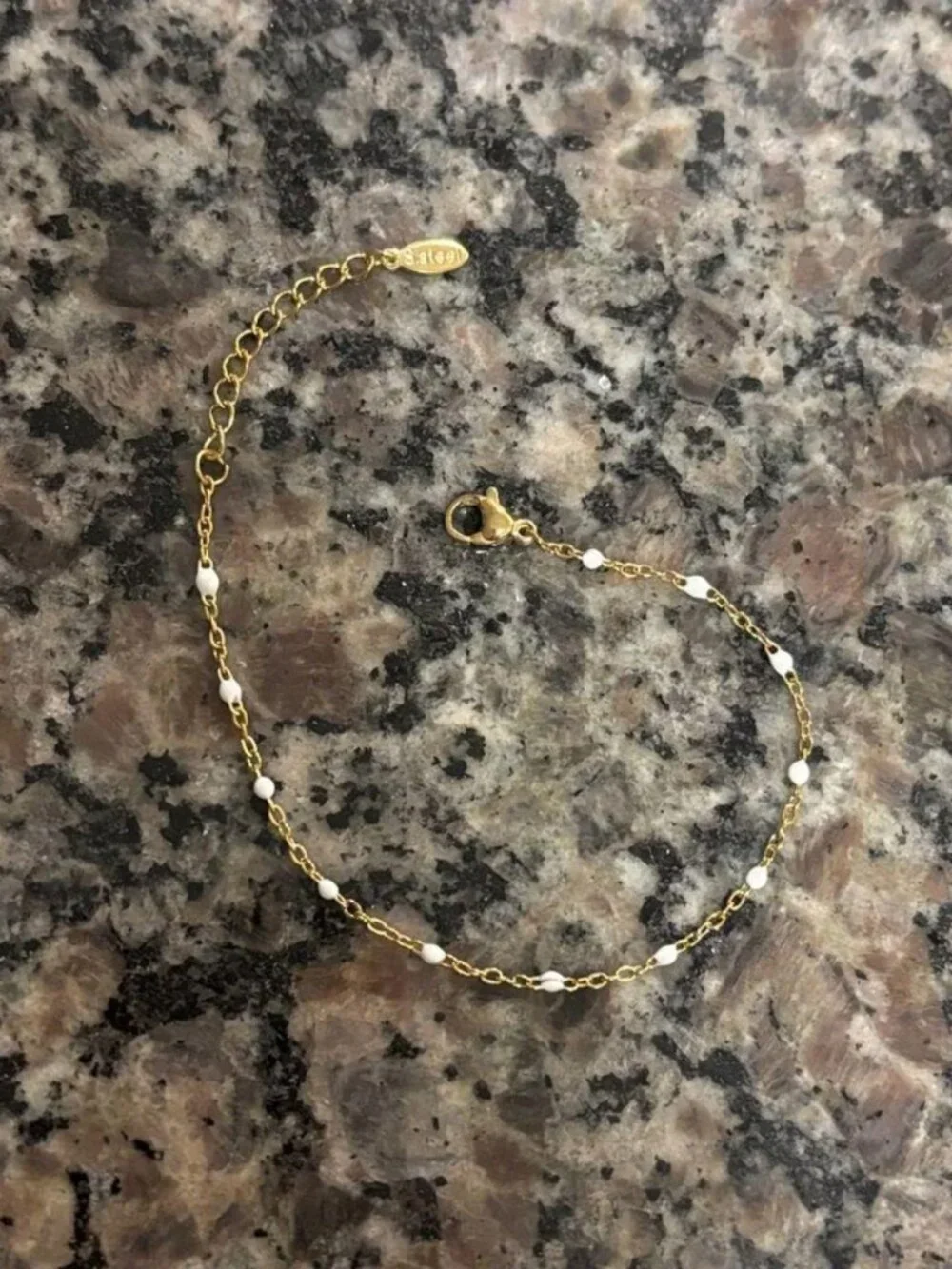 The Tristan Dainty gold and white beaded look adjustable bracelet delicate jewel
